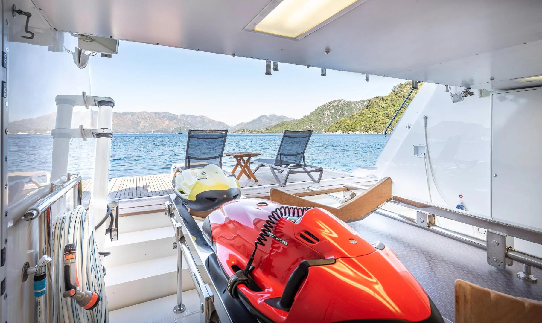 a boat with chairs on the deck aboard ARGENTO Yacht for Sale