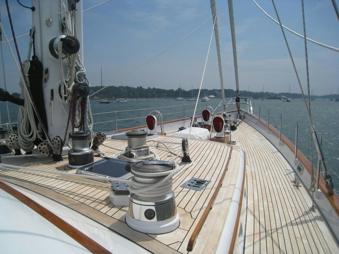 a deck with a boat on it aboard AXIA Yacht for Sale