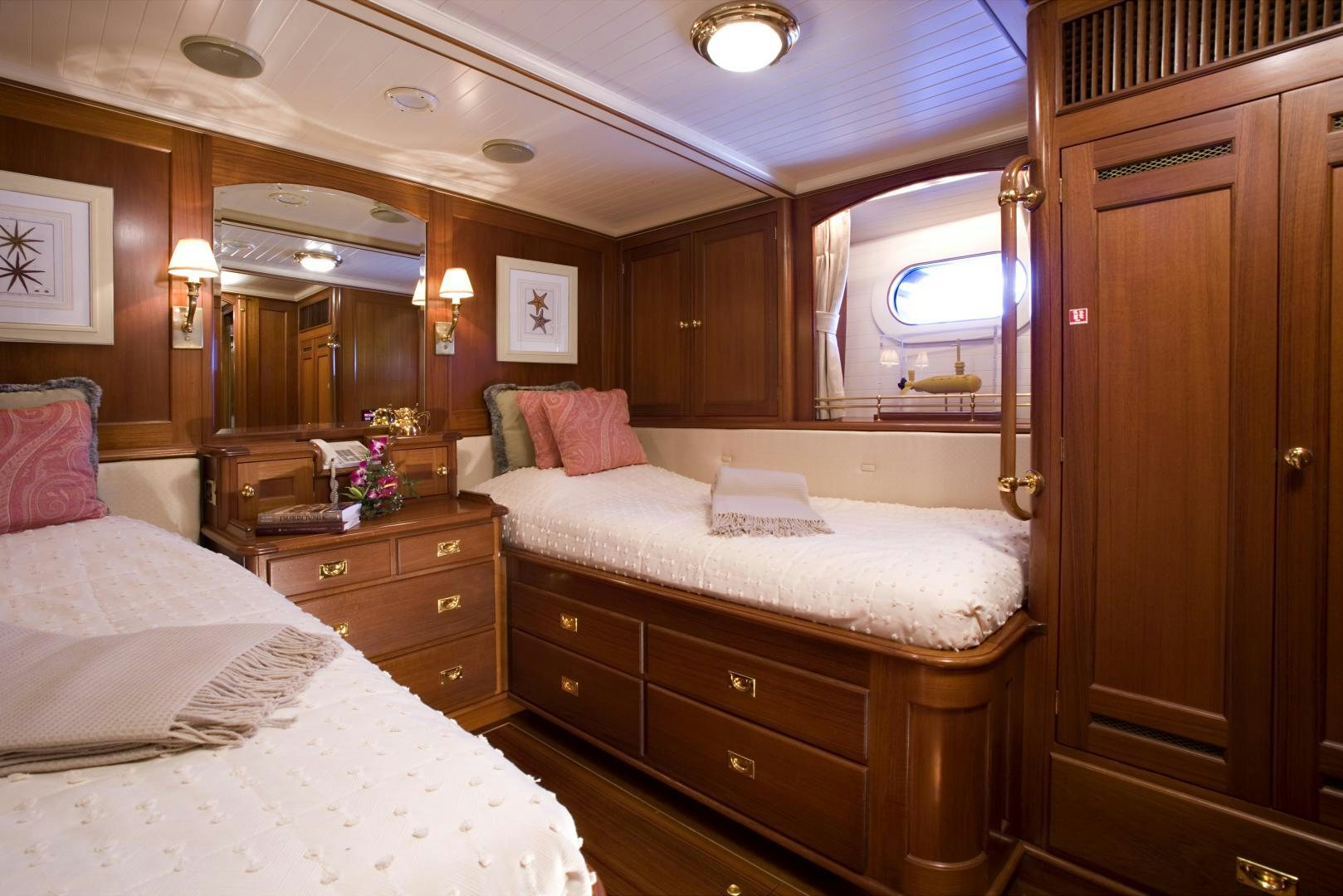 a room with two beds aboard AXIA Yacht for Sale