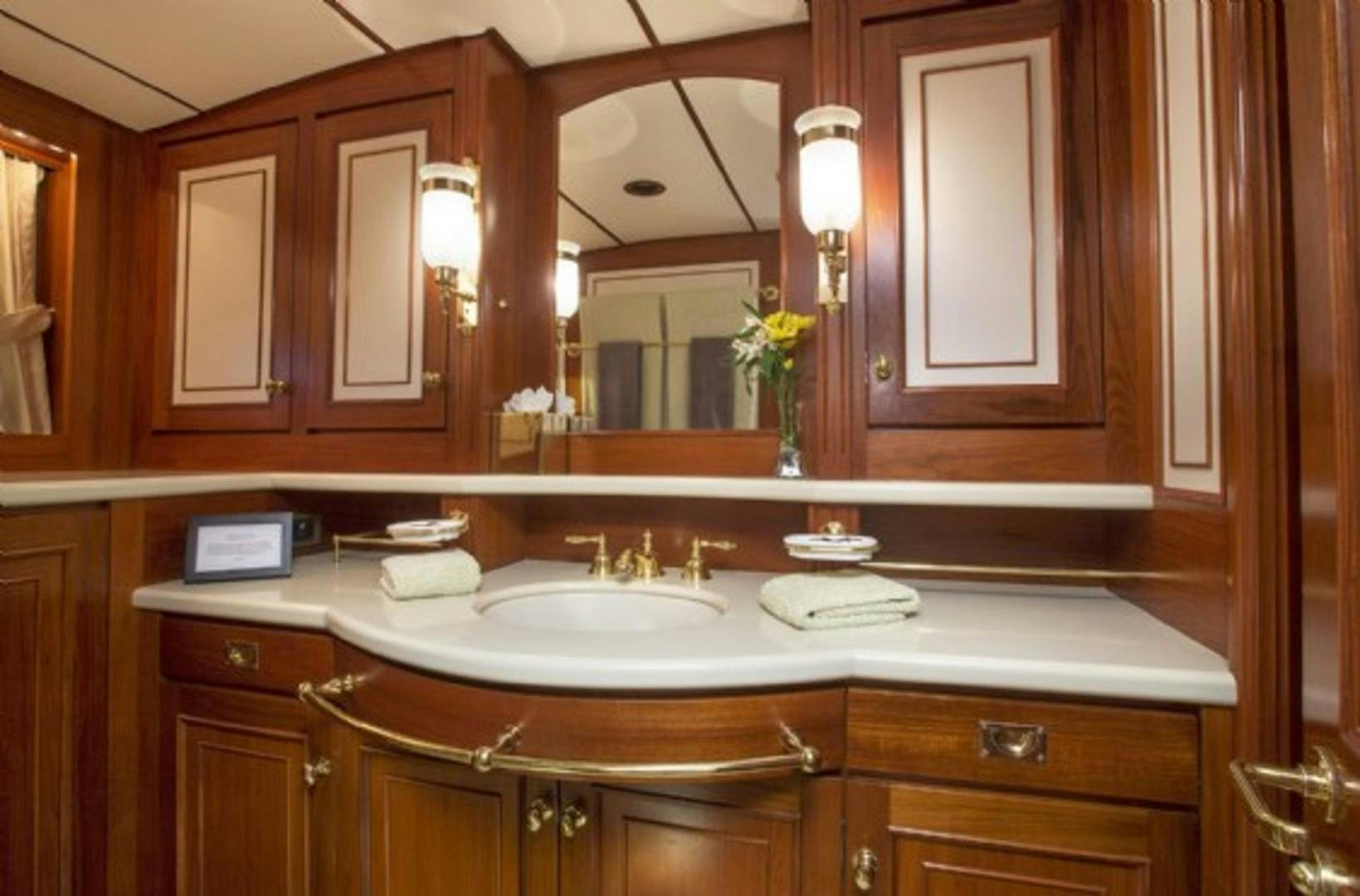 a bathroom with a large mirror aboard GALILEO Yacht for Sale