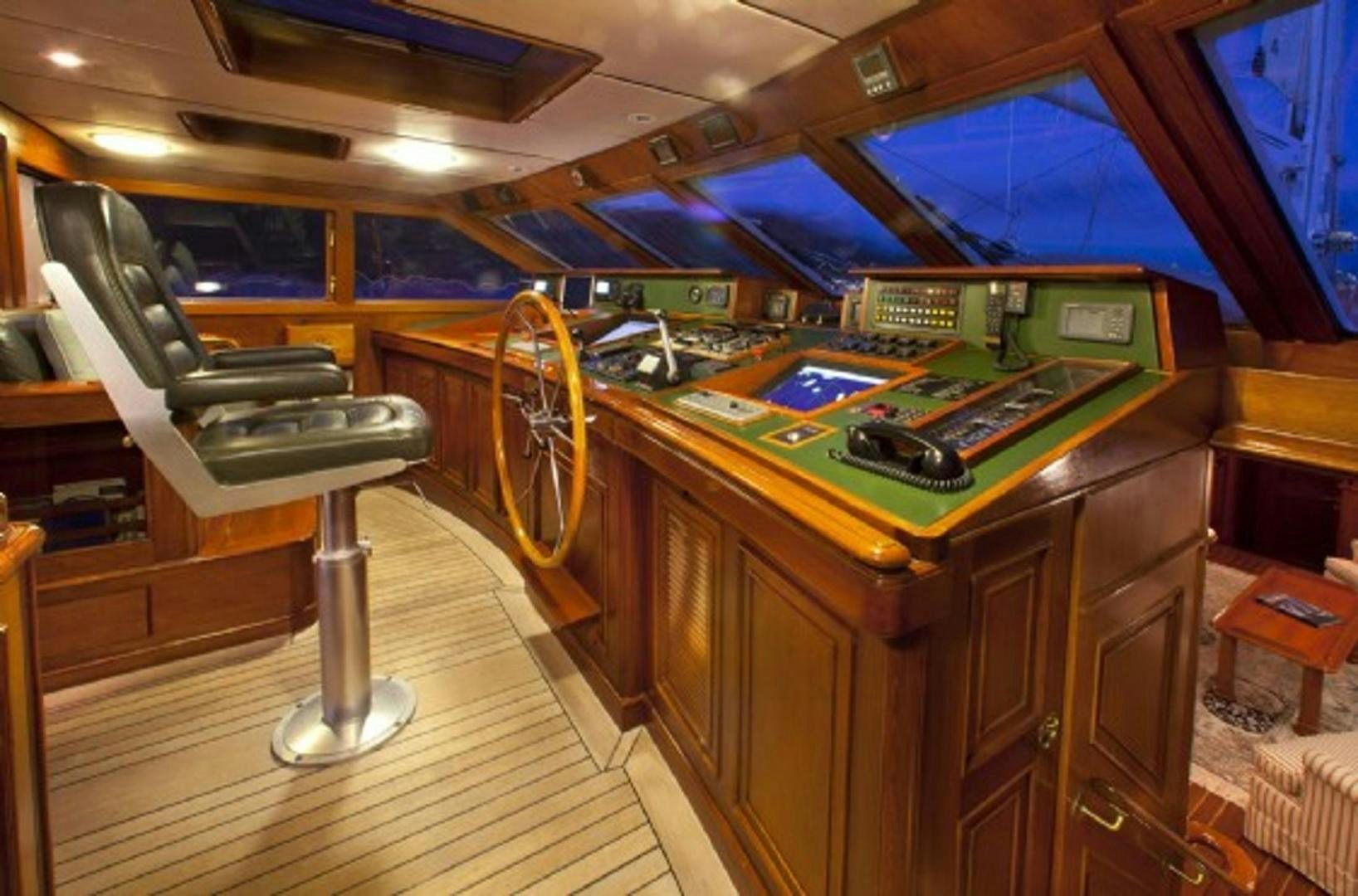 a room with a desk and a chair aboard GALILEO Yacht for Sale