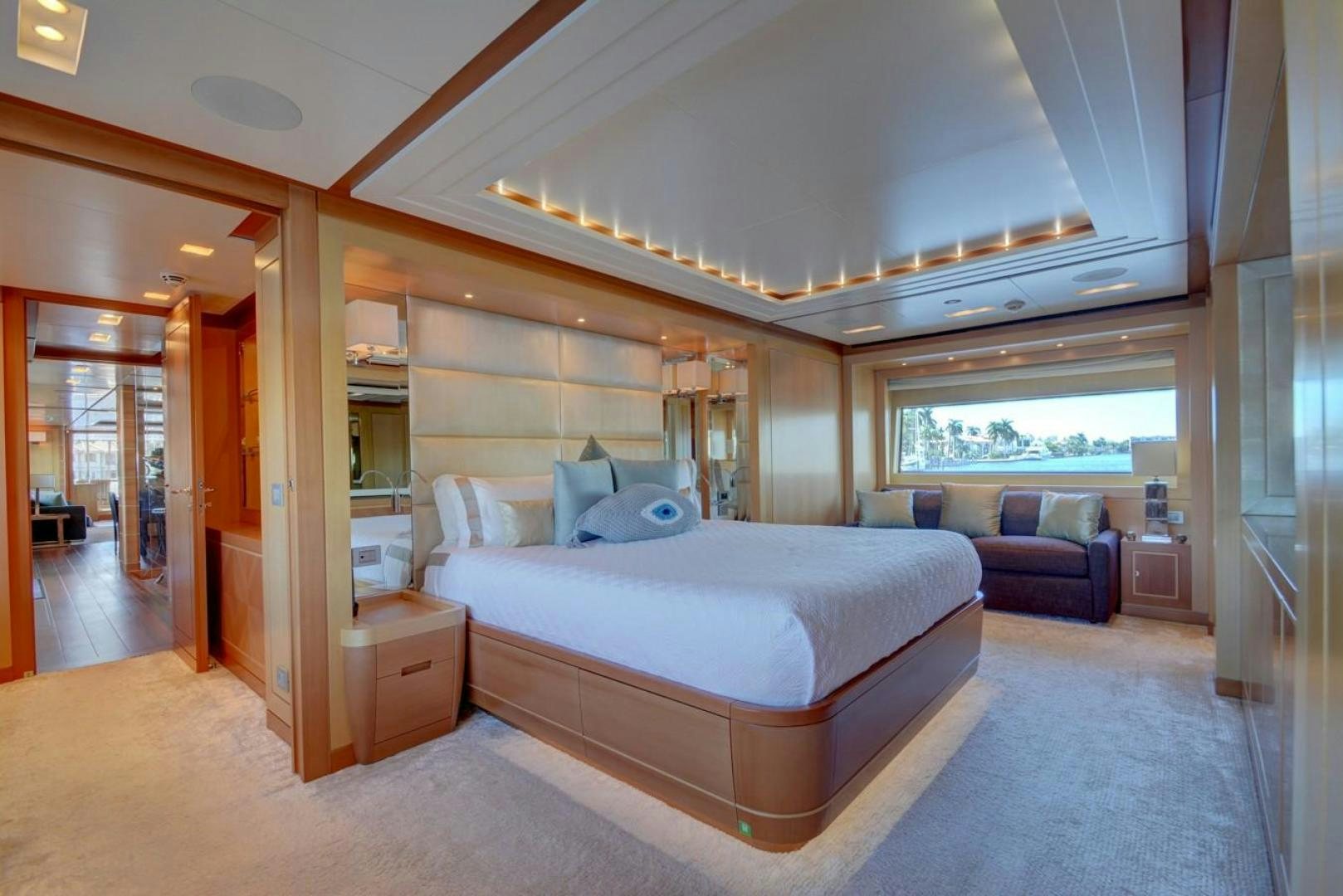 a large bedroom with a bed aboard KAOS Yacht for Sale
