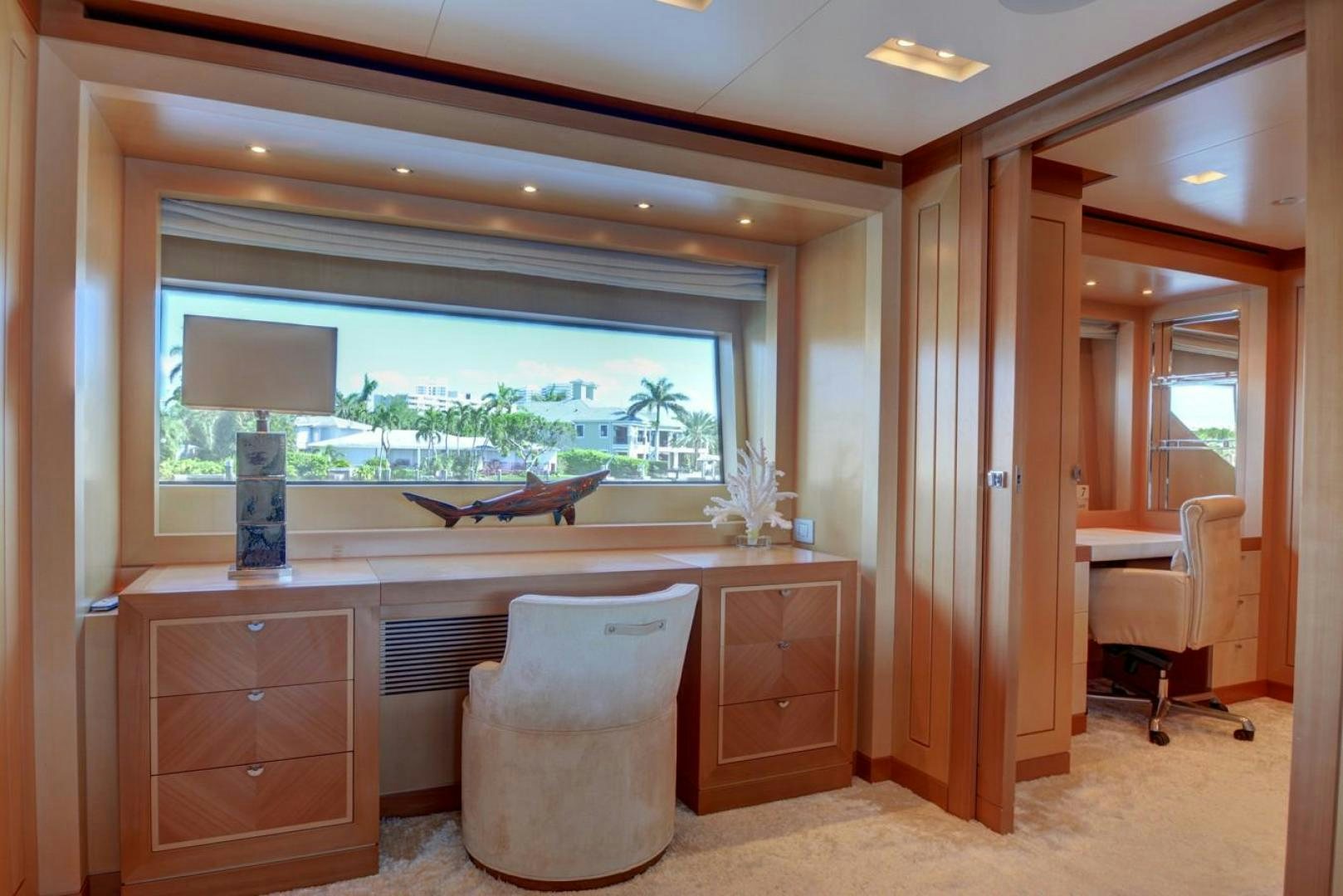 a room with a chair and a desk aboard KAOS Yacht for Sale