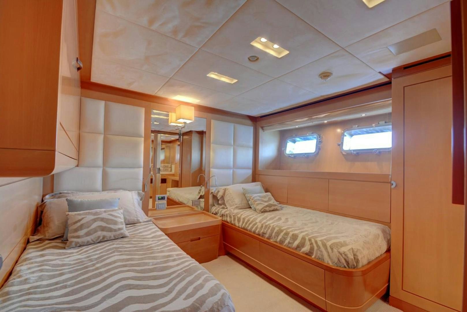 a room with two beds aboard KAOS Yacht for Sale