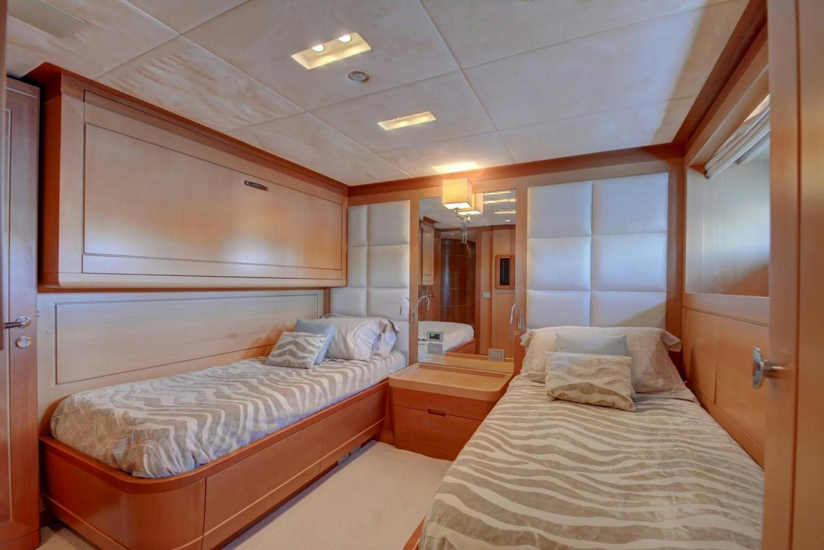 a room with two beds aboard KAOS Yacht for Sale