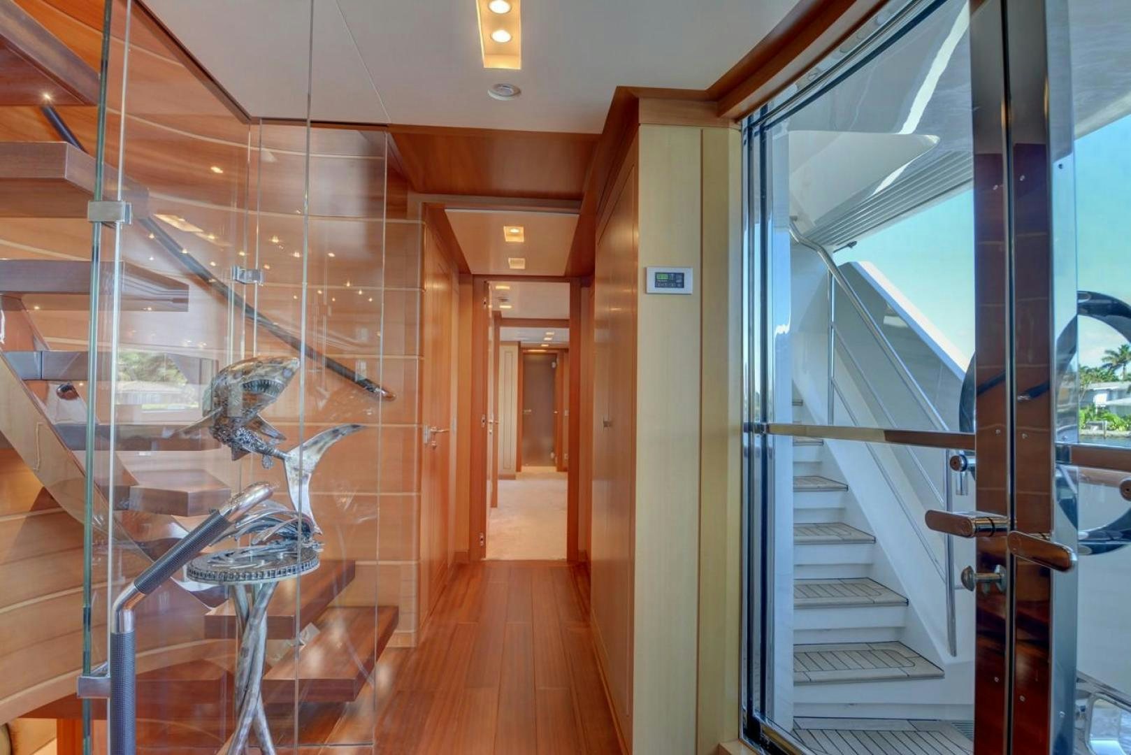 a room with glass doors aboard KAOS Yacht for Sale