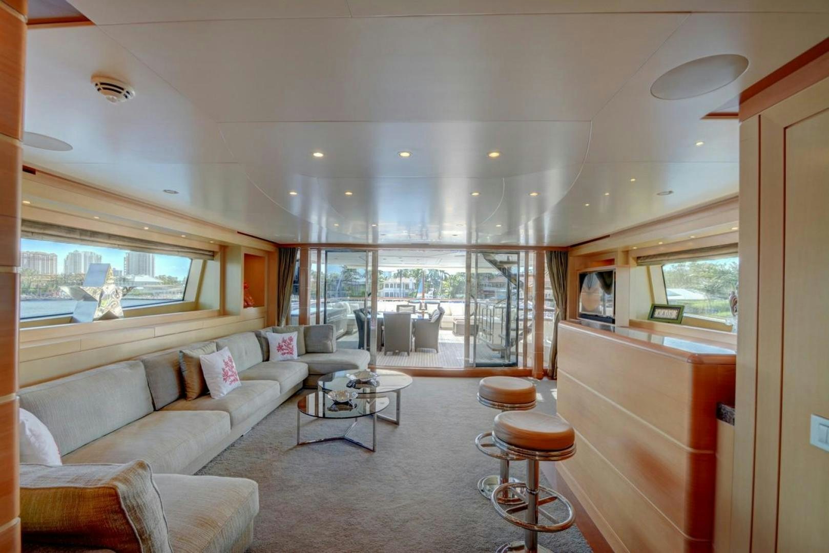 a living room with a large window aboard KAOS Yacht for Sale