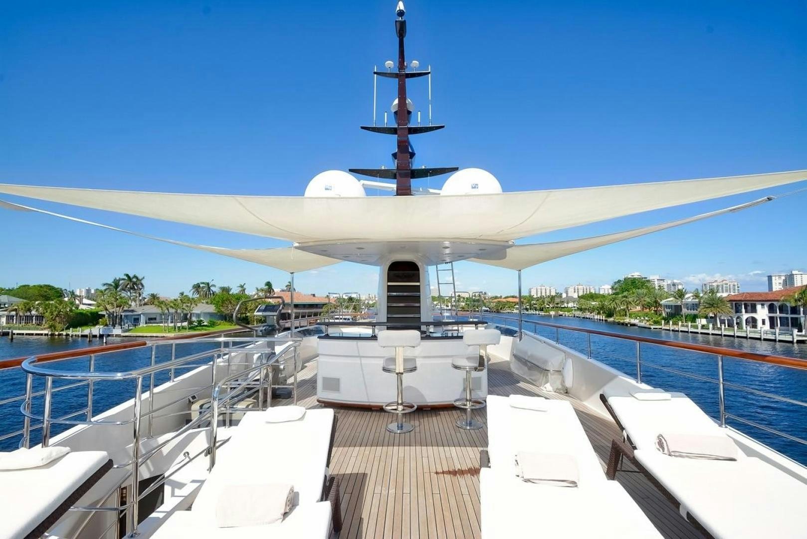 a large white building with a tower aboard KAOS Yacht for Sale