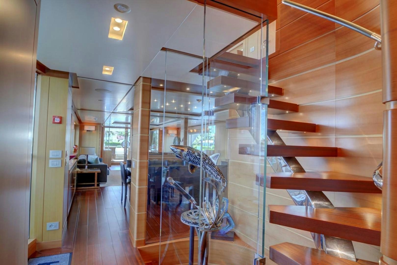 a room with a ladder and shelves aboard KAOS Yacht for Sale