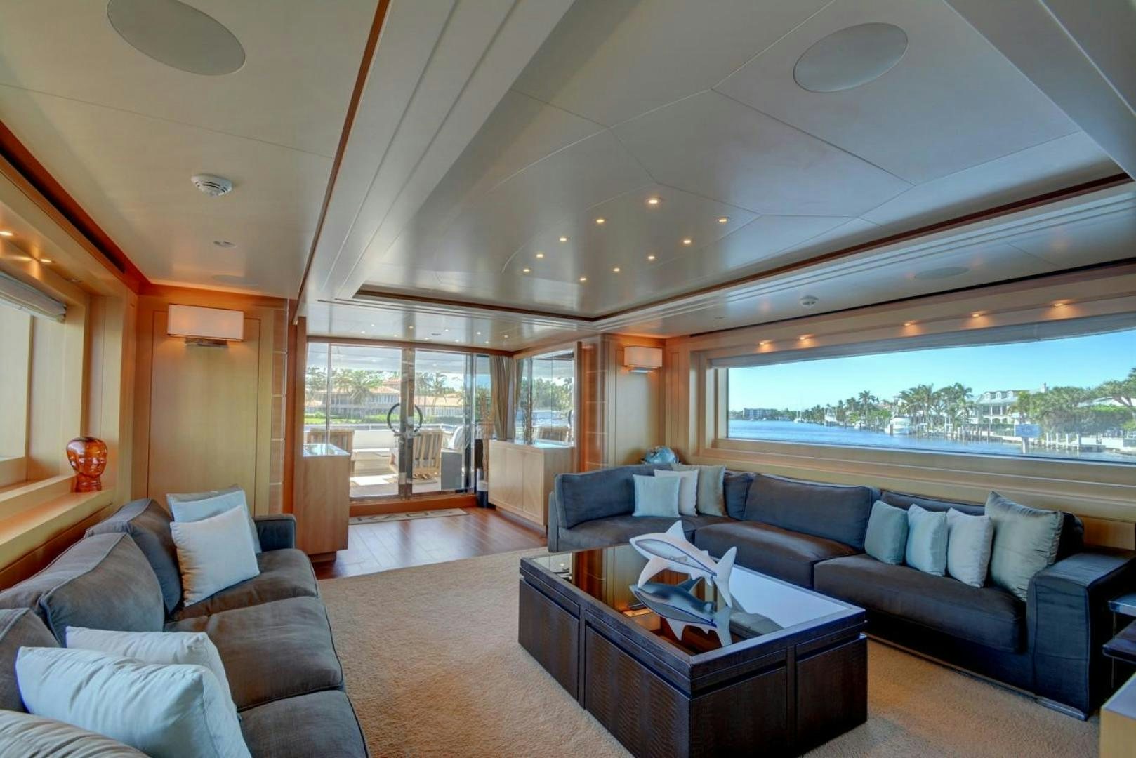 a living room with a large window aboard KAOS Yacht for Sale