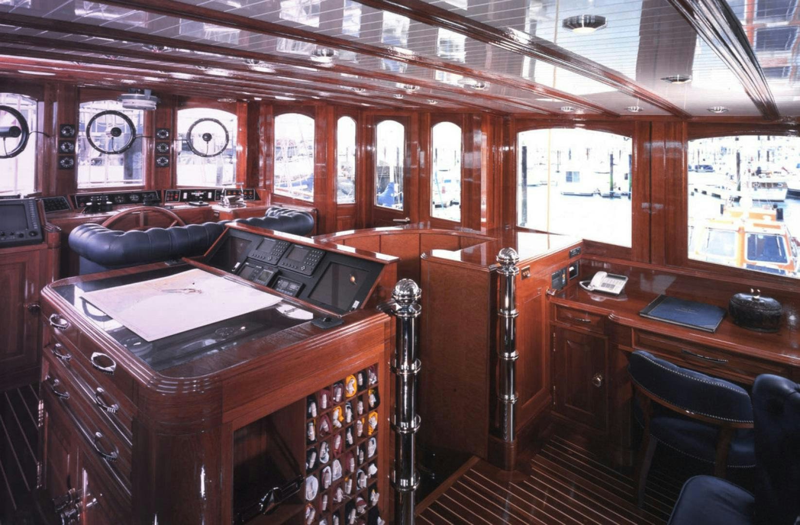 a room with a desk and a chair aboard ATLANTIDE Yacht for Sale