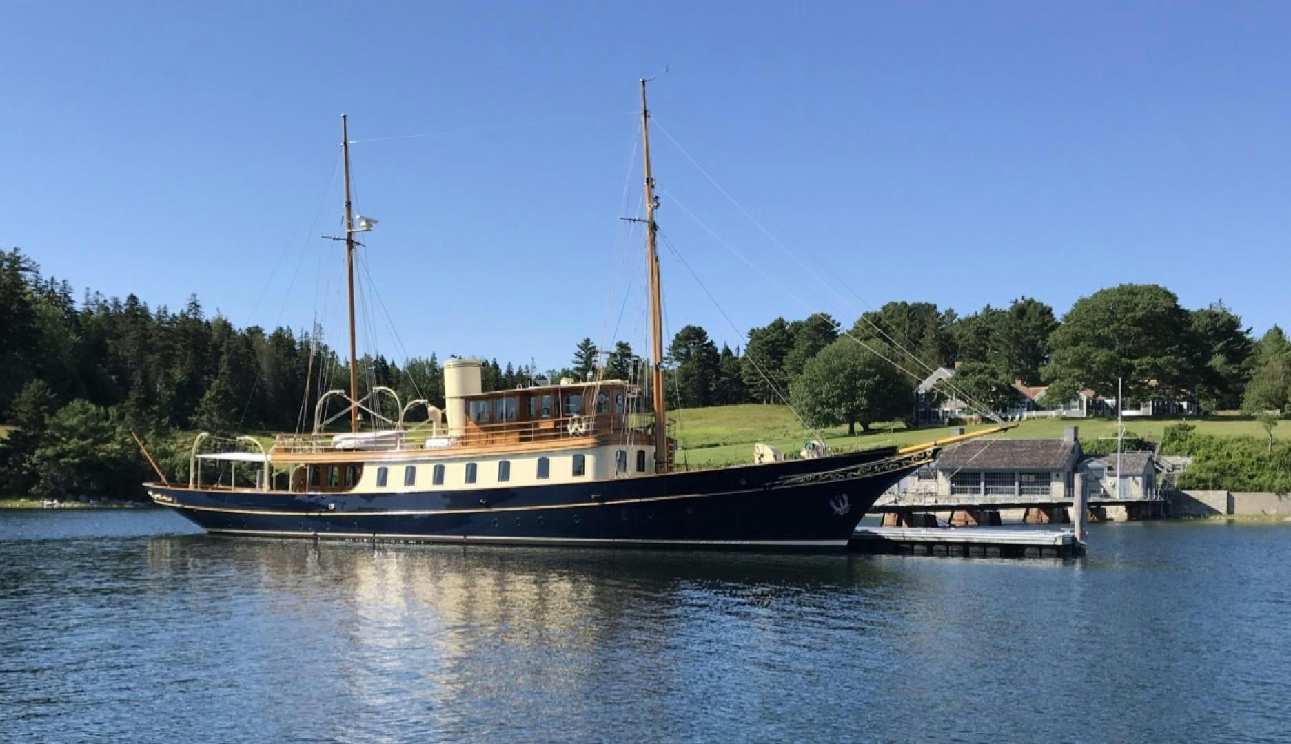 a boat docked at a pier aboard ATLANTIDE Yacht for Sale