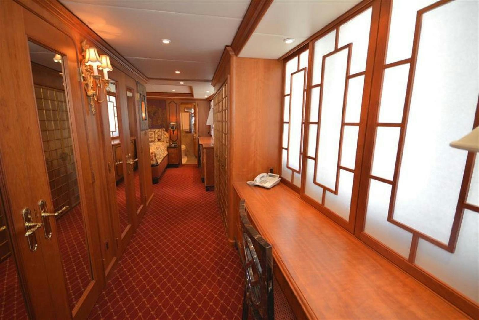a hallway with a wood floor aboard AR DE Yacht for Sale
