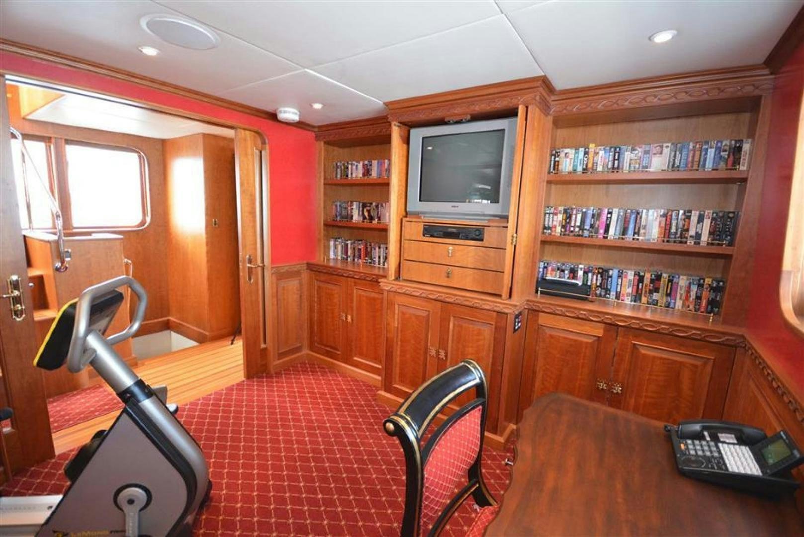 a room with a desk and a tv aboard AR DE Yacht for Sale