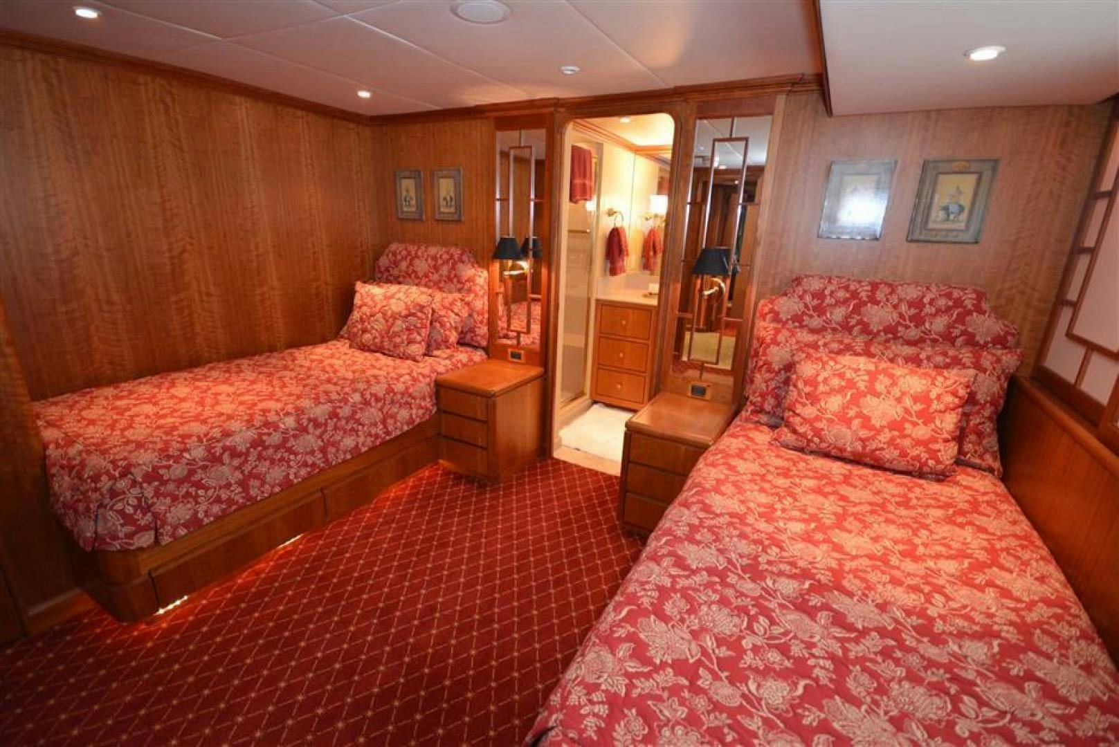 a bedroom with two beds aboard AR DE Yacht for Sale