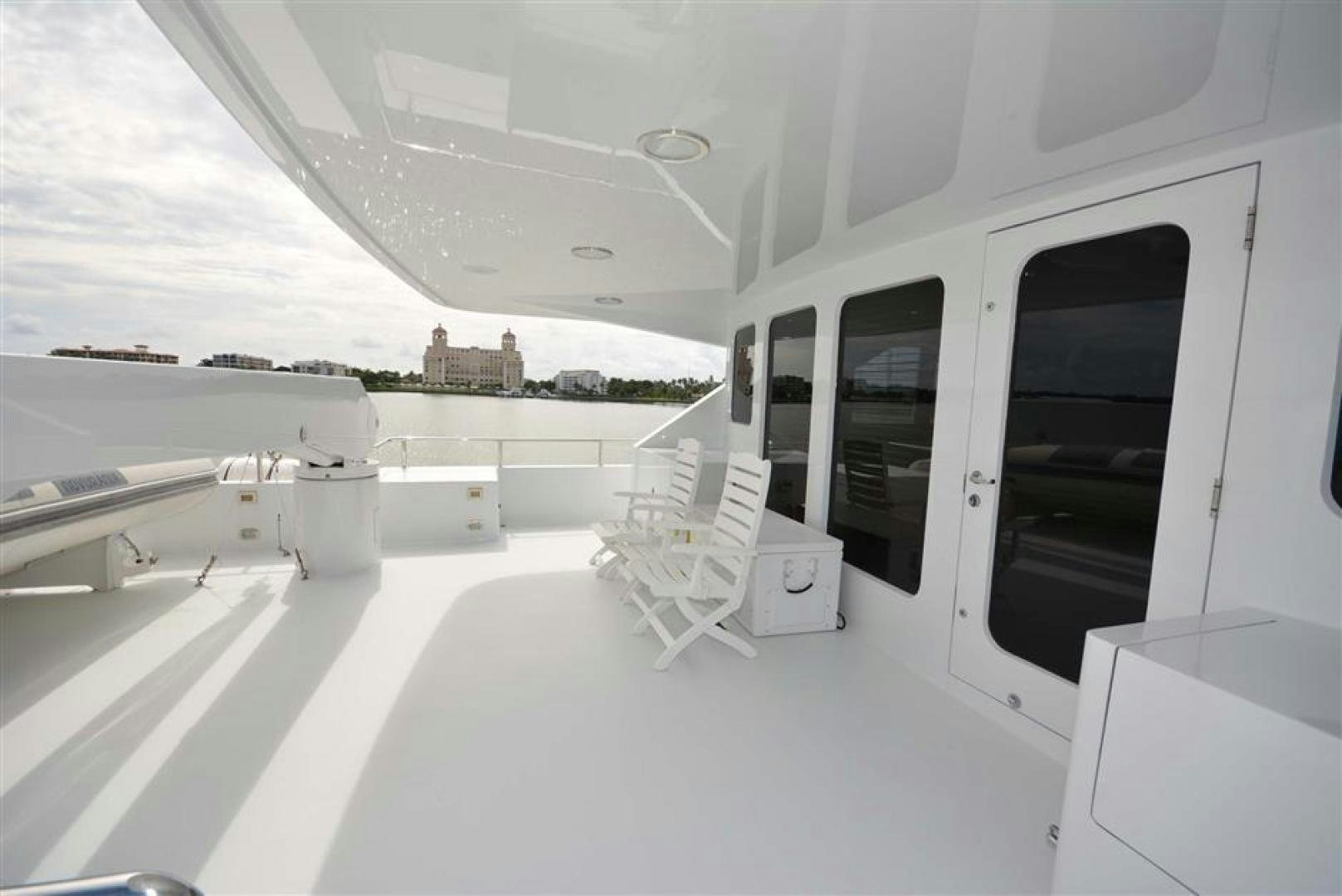 inside of a white car aboard AR DE Yacht for Sale