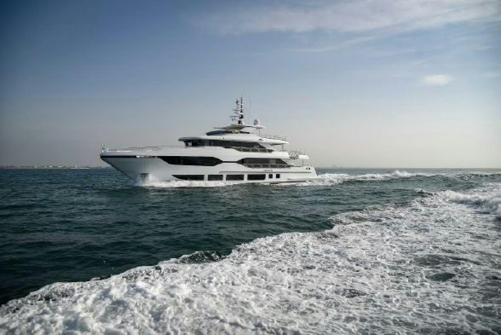 a white boat in the water aboard No Name Yacht for Sale
