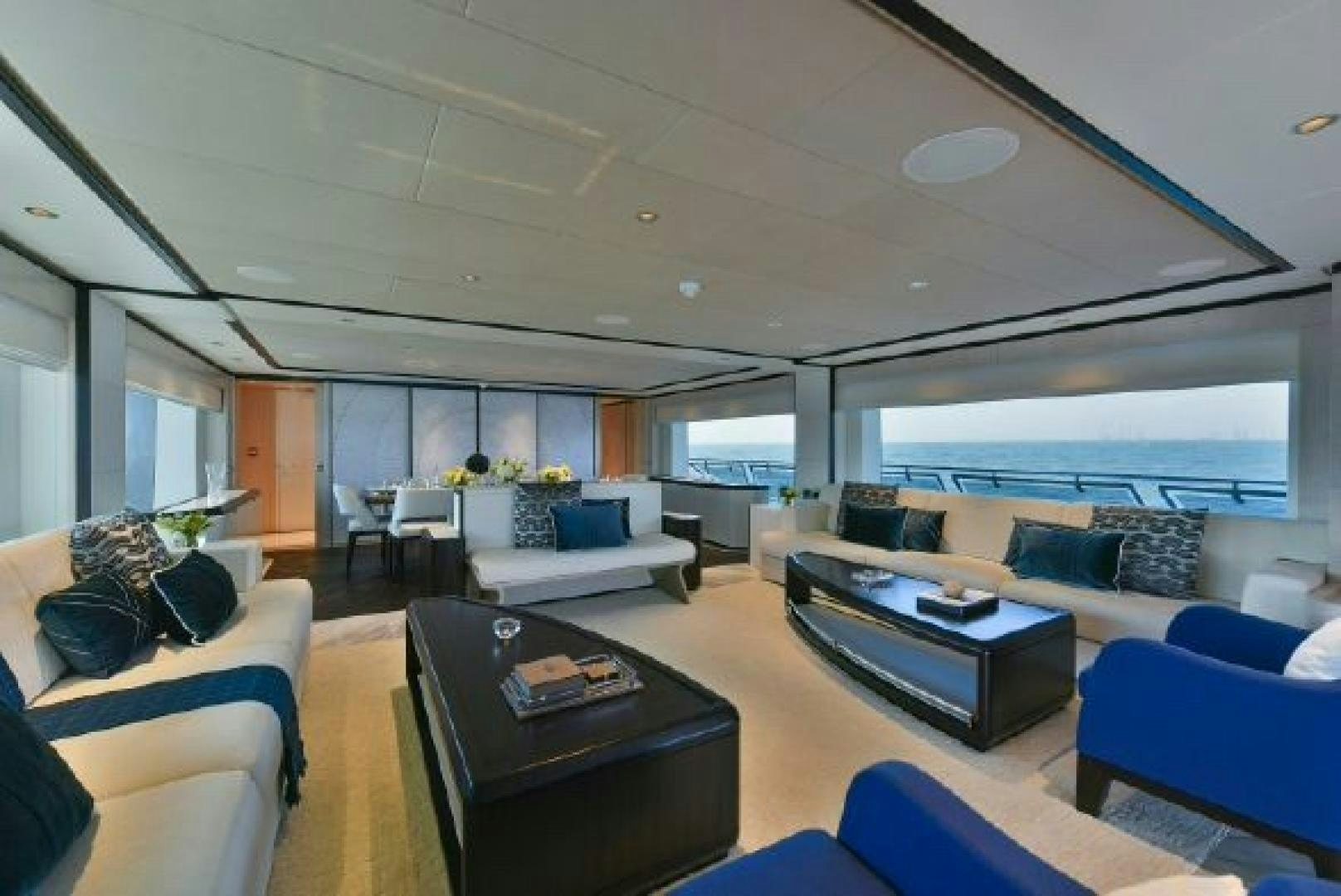a living room with a large window aboard No Name Yacht for Sale