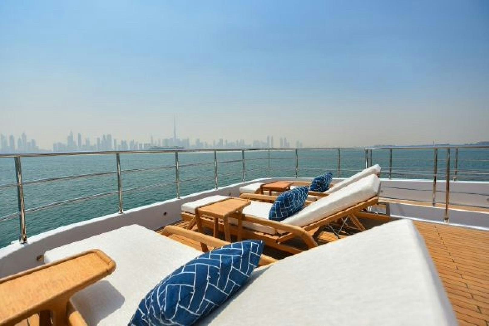 a balcony with a view of a city aboard No Name Yacht for Sale