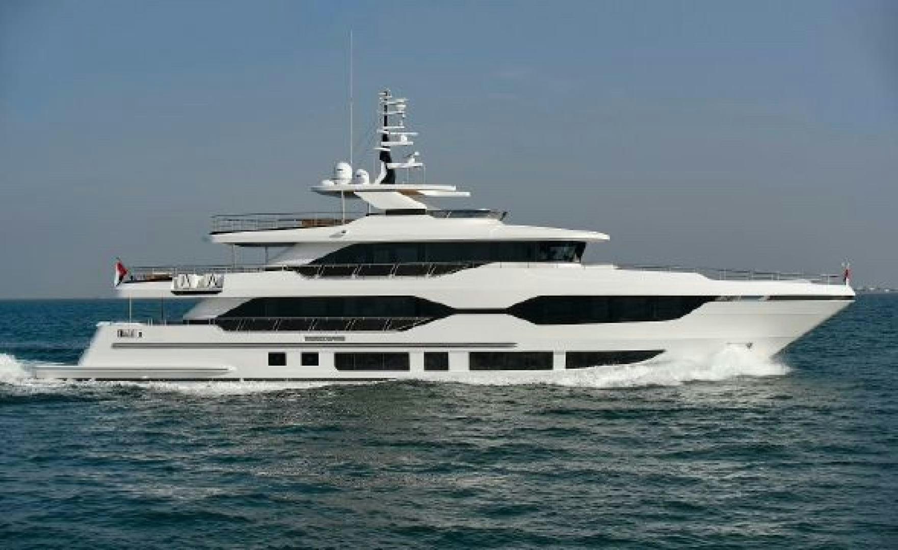 a white yacht on the water aboard No Name Yacht for Sale
