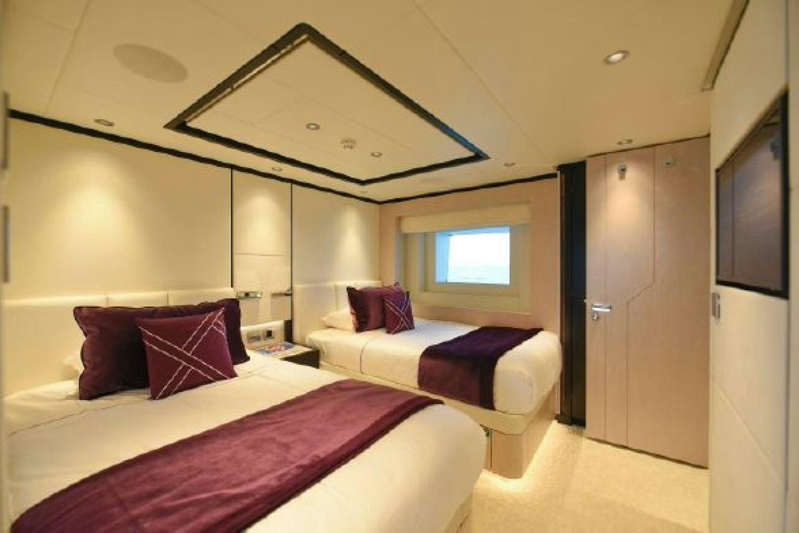 a room with two beds aboard No Name Yacht for Sale