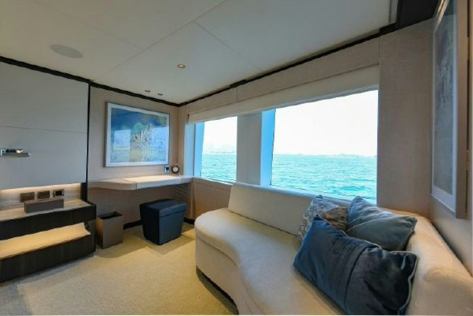 a living room with a large window aboard No Name Yacht for Sale