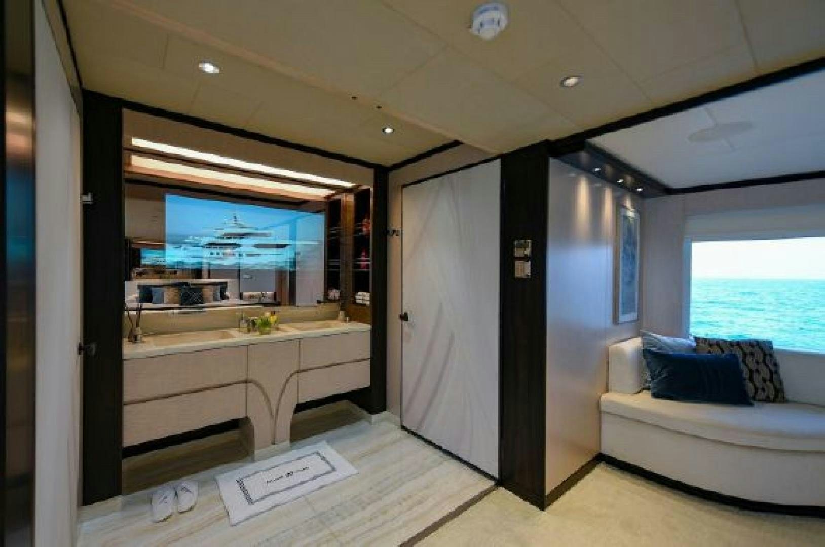 a room with a bed and a large window aboard No Name Yacht for Sale