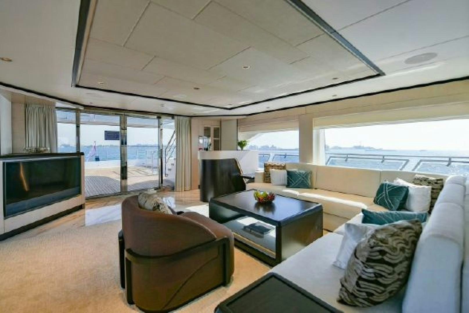a living room with a large window aboard No Name Yacht for Sale