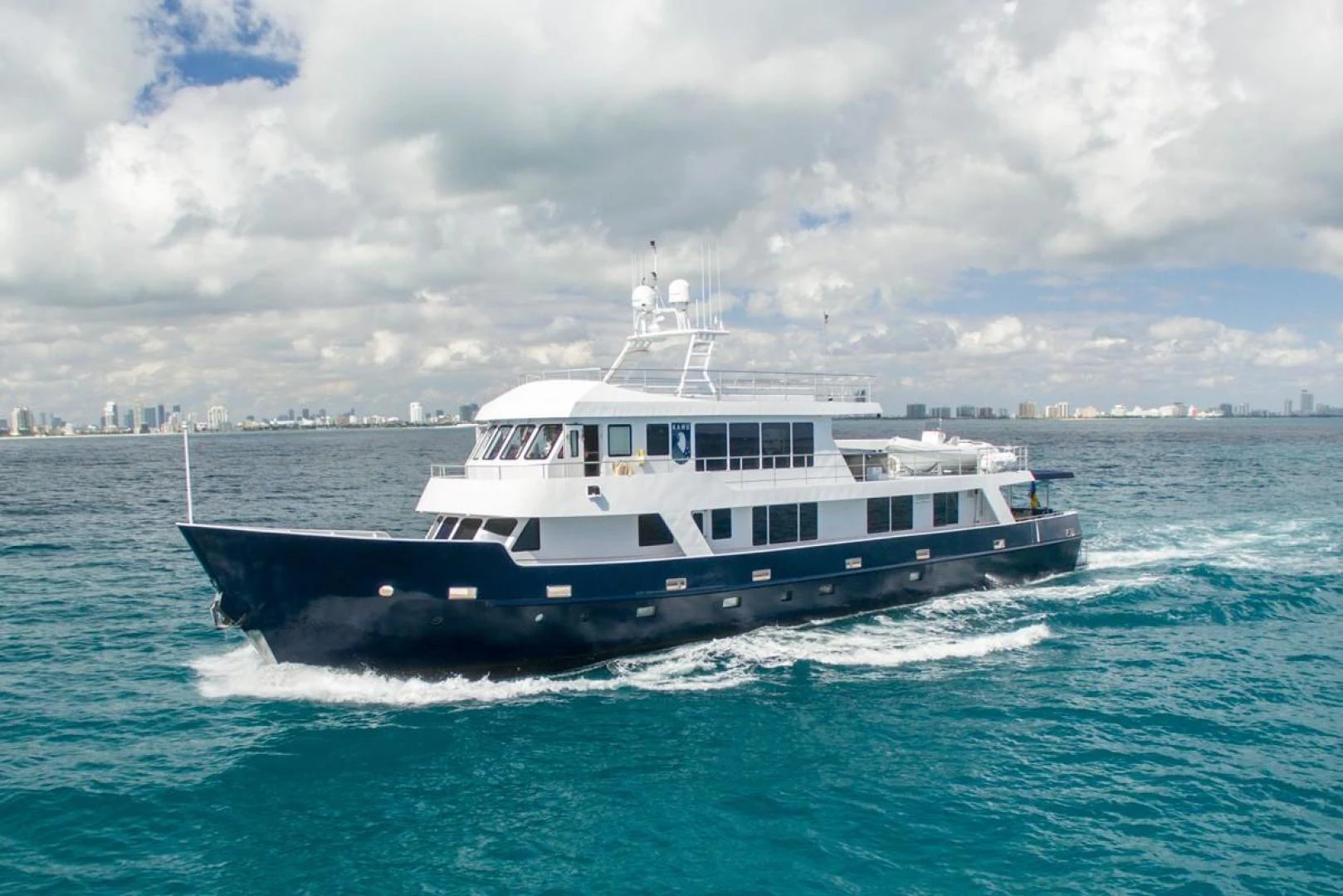 a boat on the water aboard KAHU Yacht for Sale