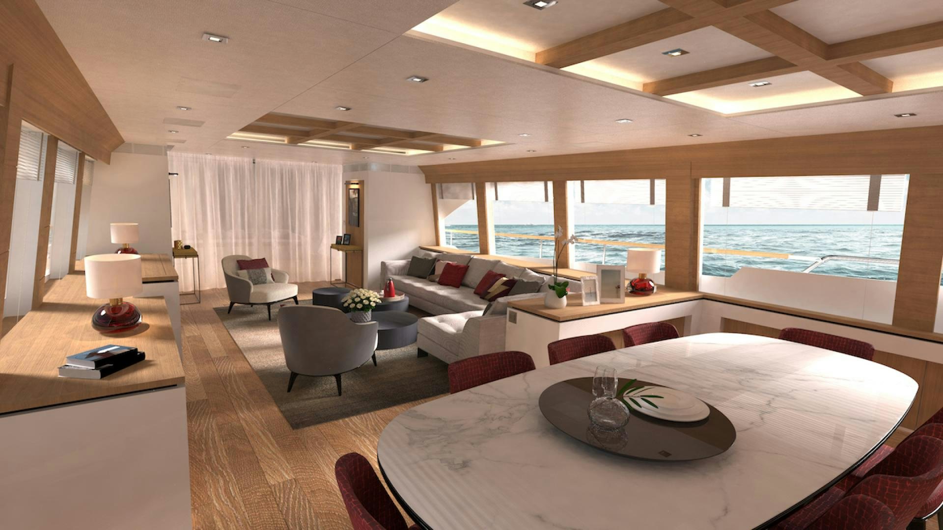 a large room with a large white table and chairs aboard No Name Yacht for Sale