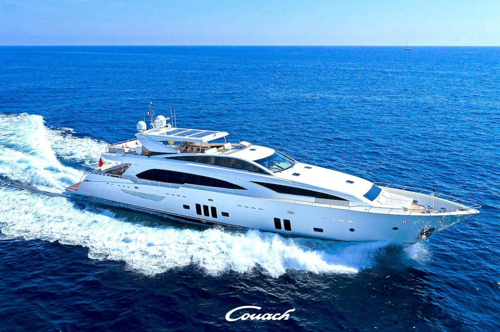 a white yacht on the water aboard No Name Yacht for Sale