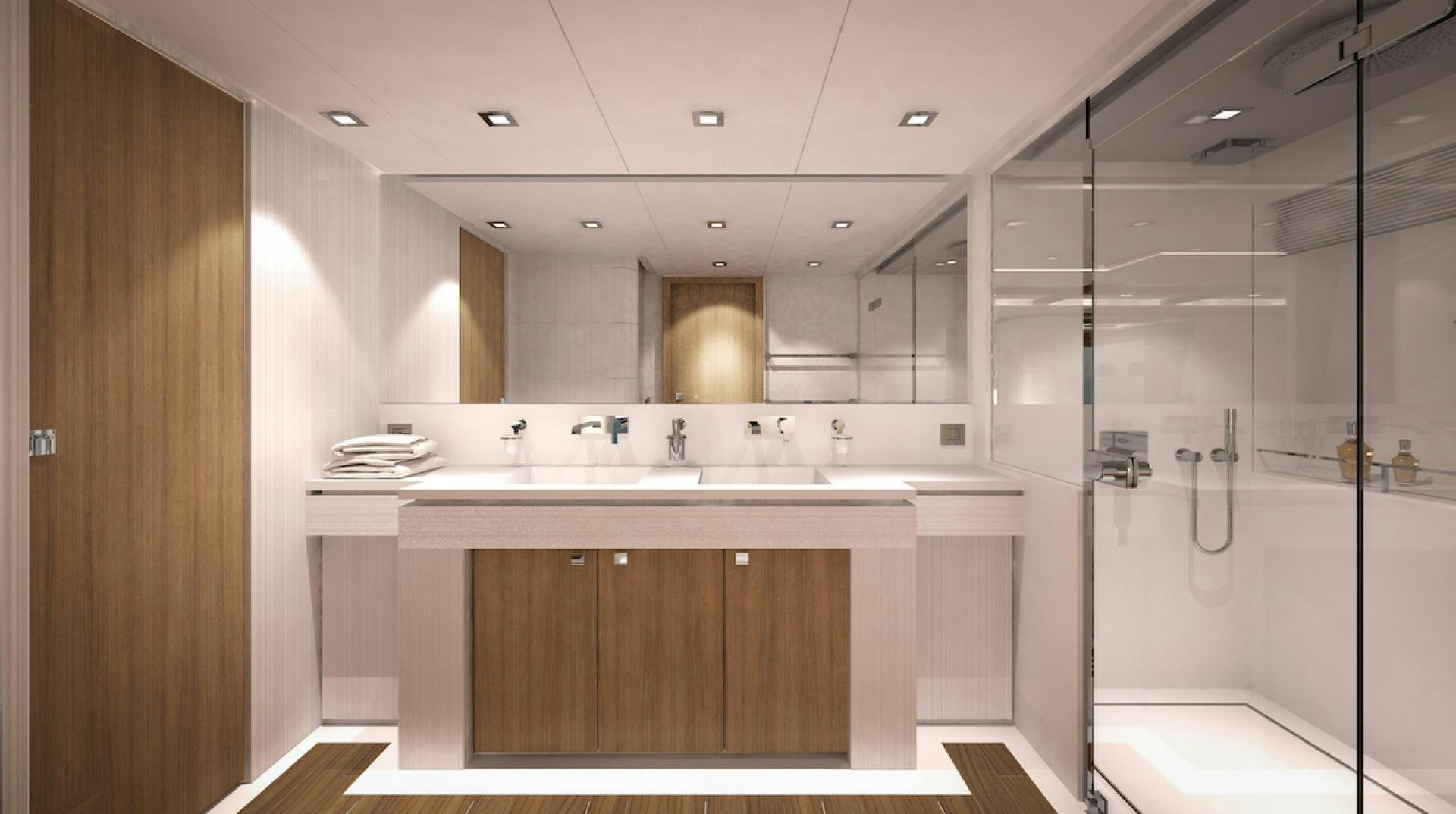 a bathroom with a glass shower aboard No Name Yacht for Sale