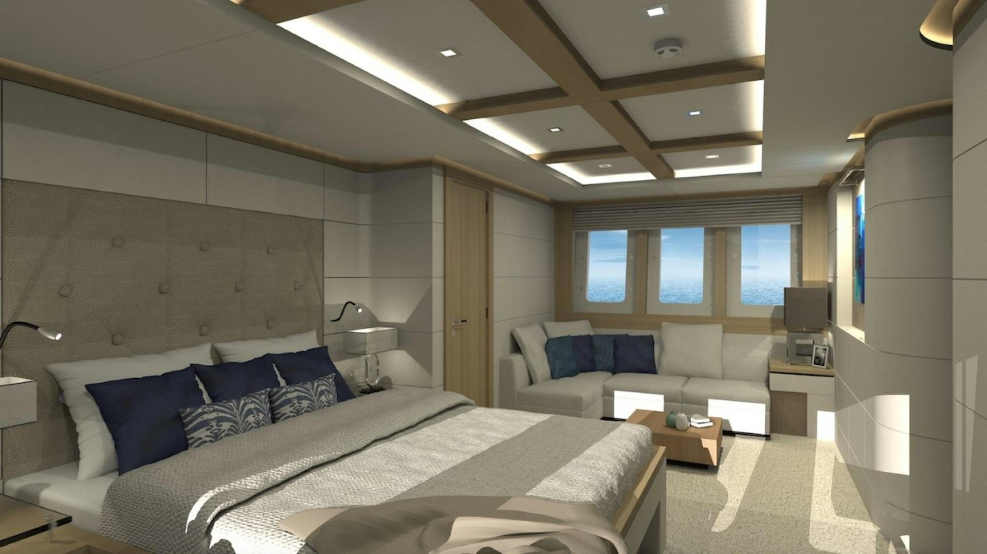 a room with a bed and a couch aboard No Name Yacht for Sale