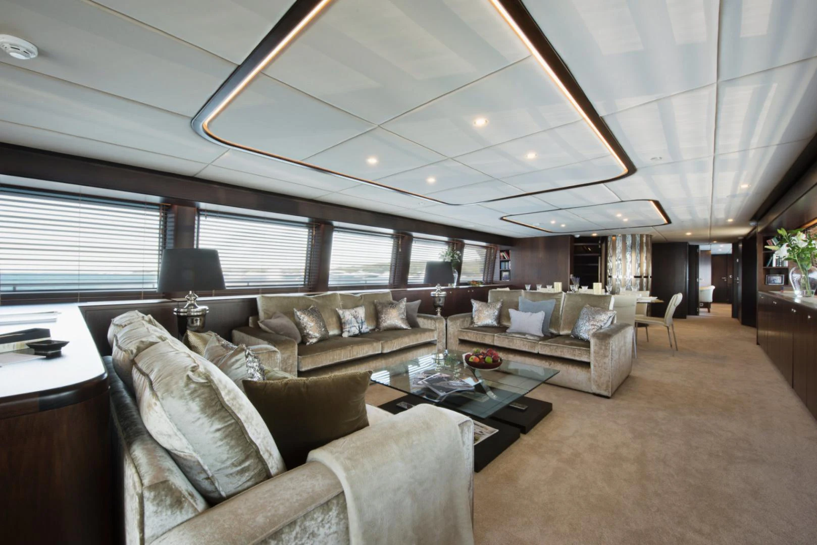 a living room with a large window aboard CRYSTAL Yacht for Sale