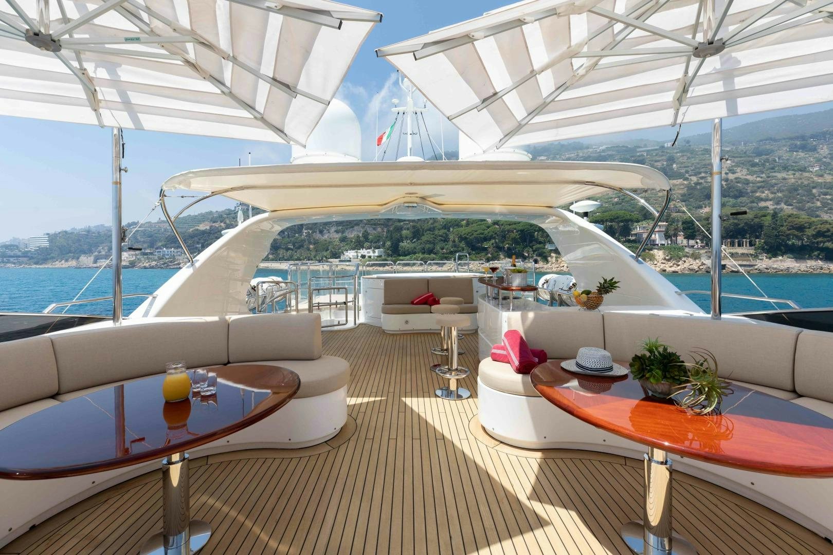 a room with a table and chairs aboard TANUSHA Yacht for Sale