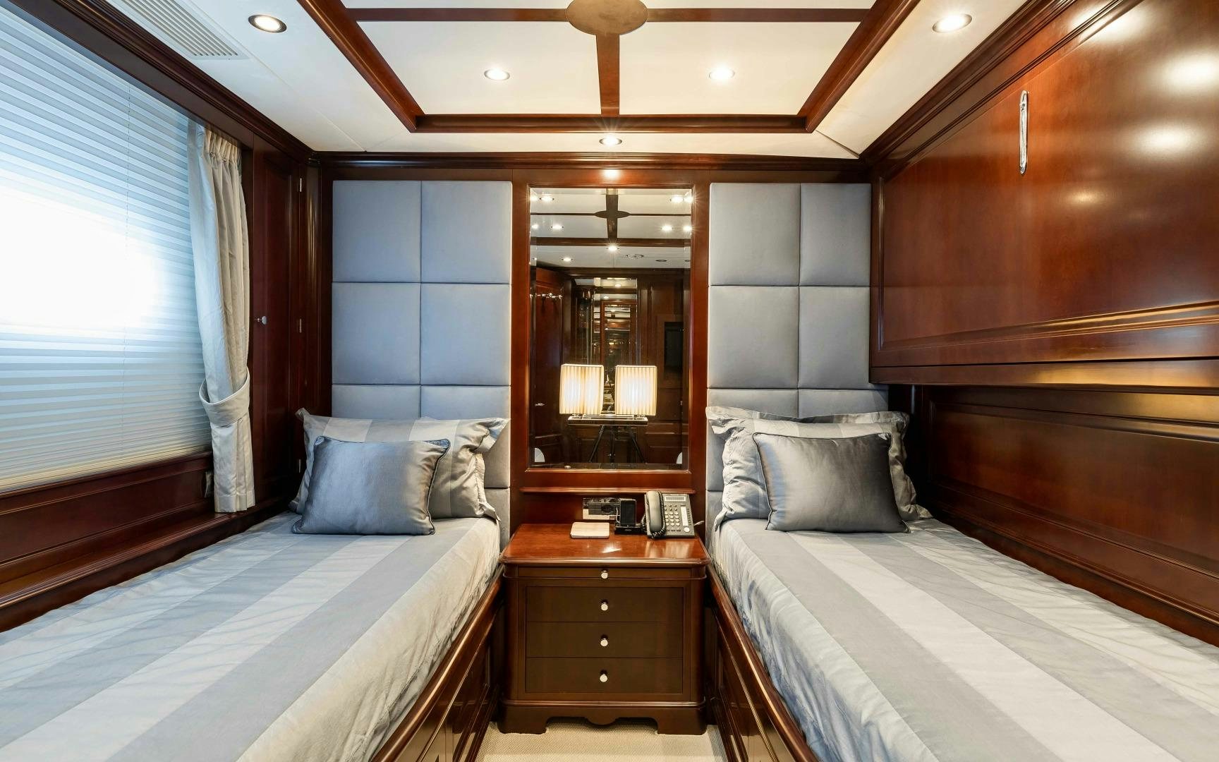 a room with two beds aboard TANUSHA Yacht for Sale