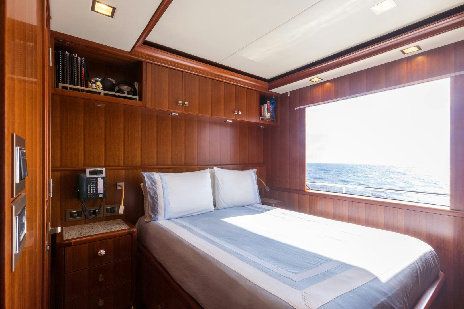 a bed in a room aboard MY AURORA Yacht for Sale