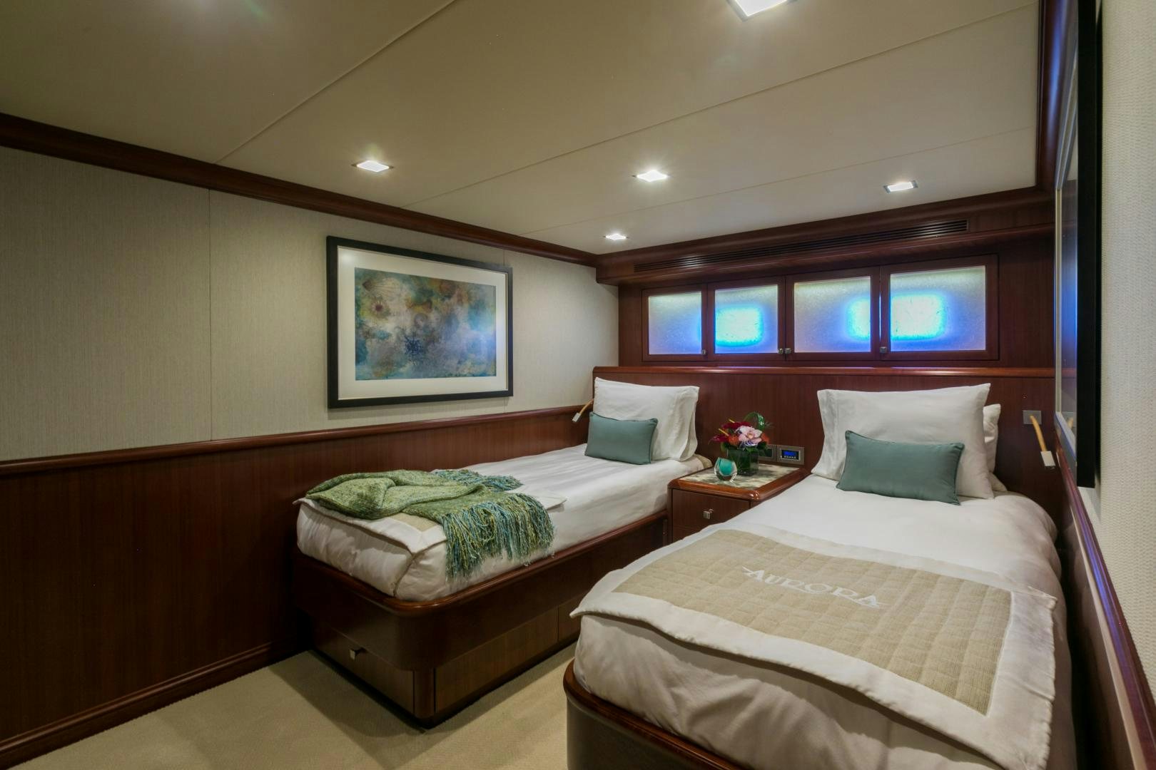 a couple of beds in a hotel room aboard MY AURORA Yacht for Sale