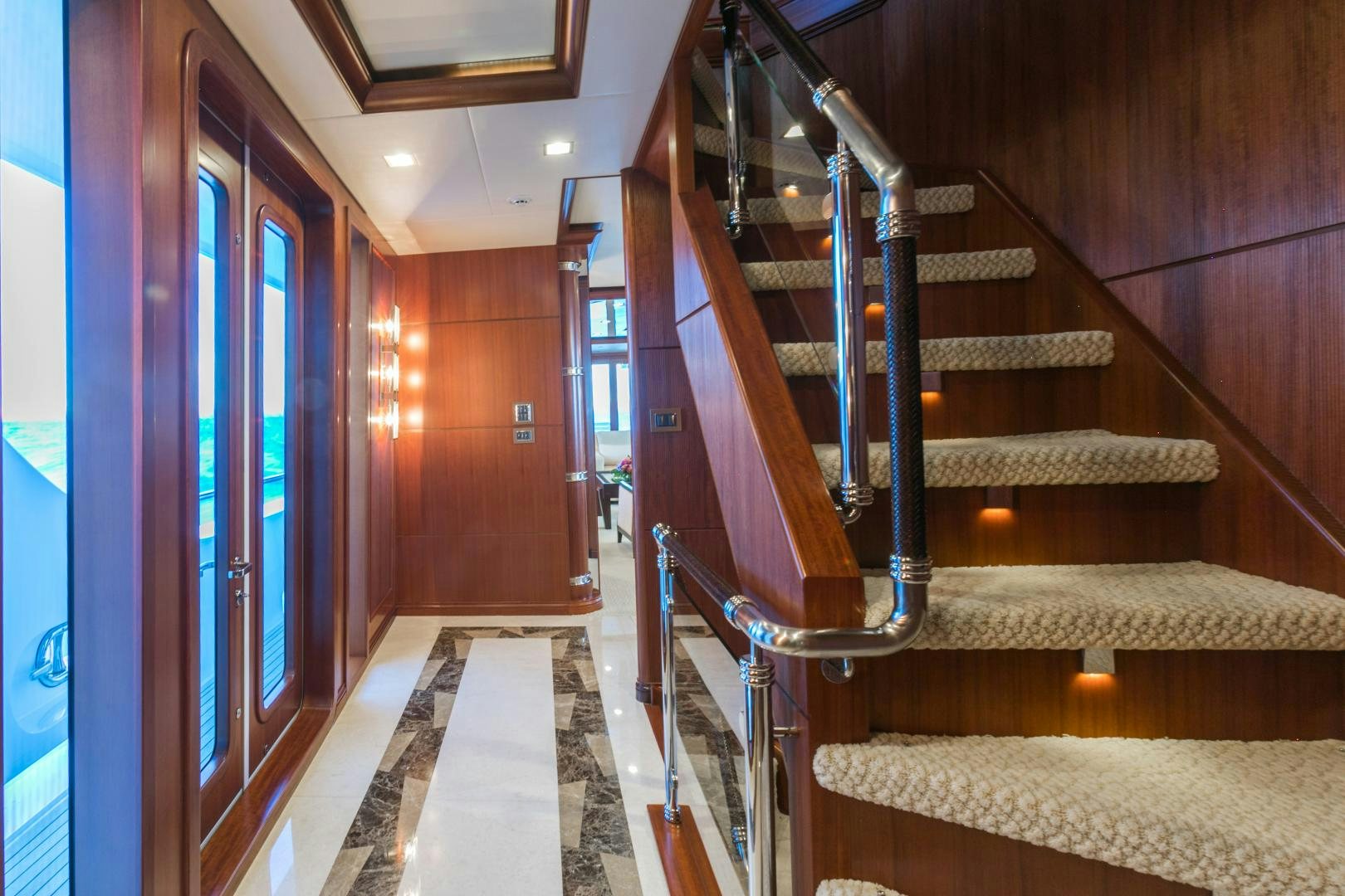a staircase in a house aboard MY AURORA Yacht for Sale