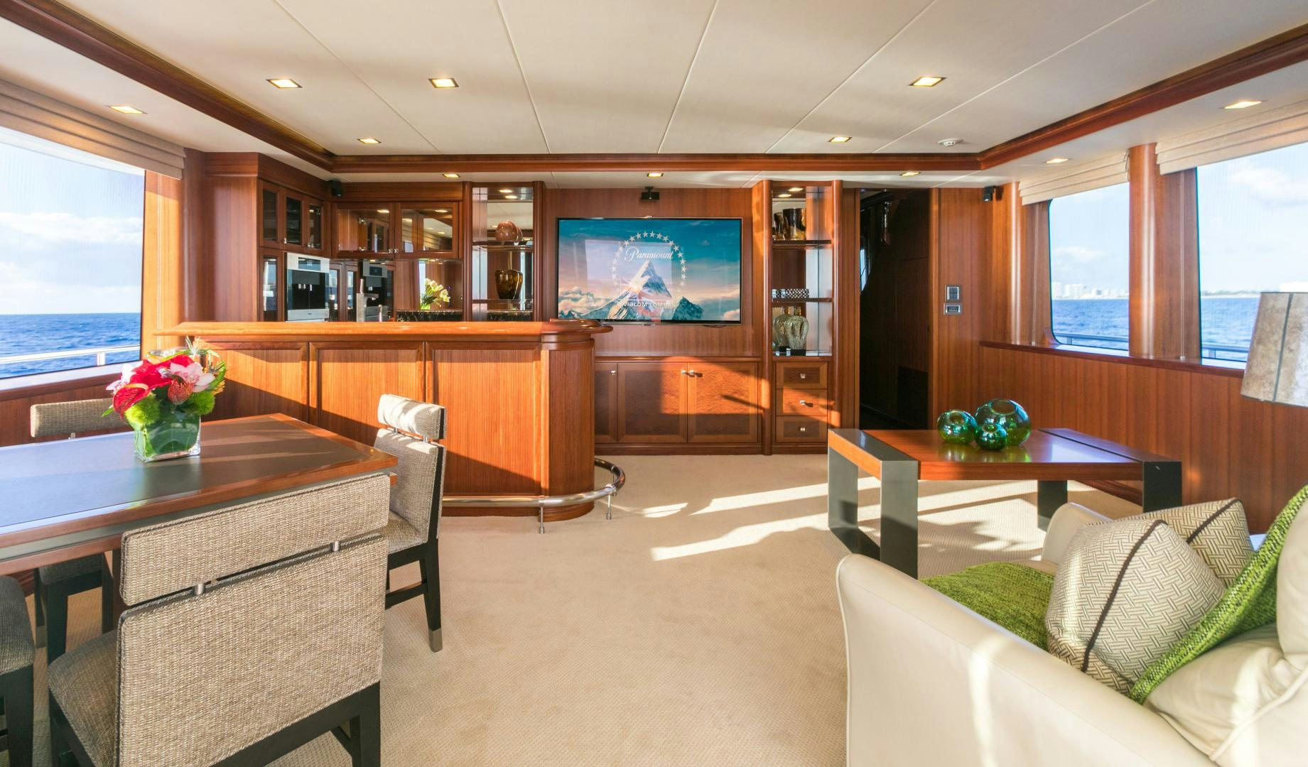 a room with a table and chairs aboard MY AURORA Yacht for Sale