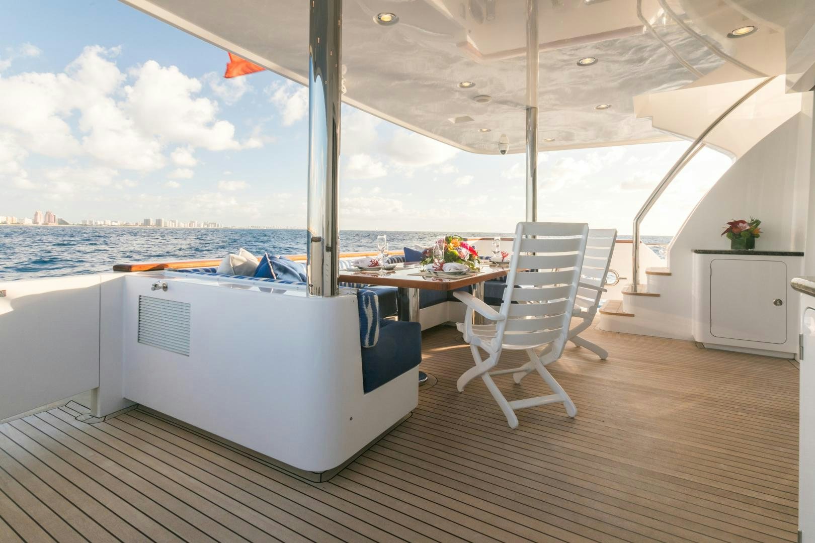 a large white boat on a deck aboard MY AURORA Yacht for Sale