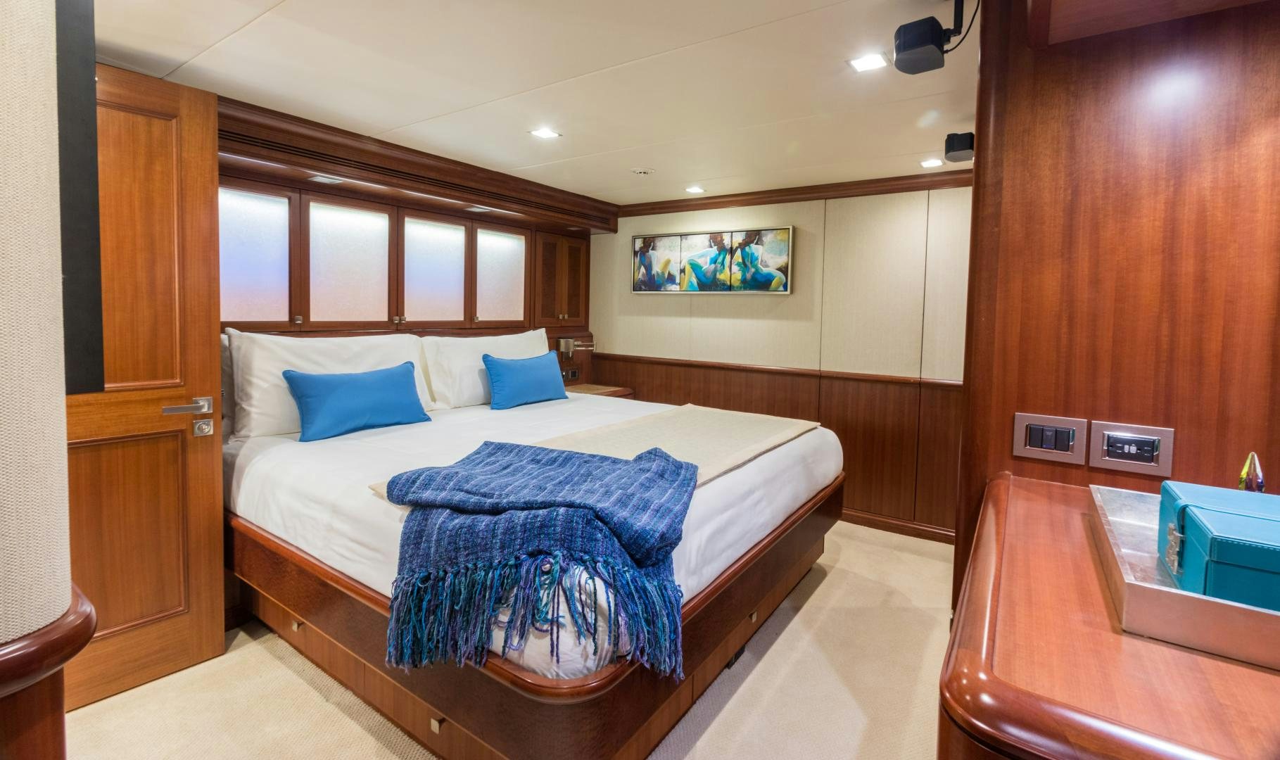 a bed in a room aboard MY AURORA Yacht for Sale