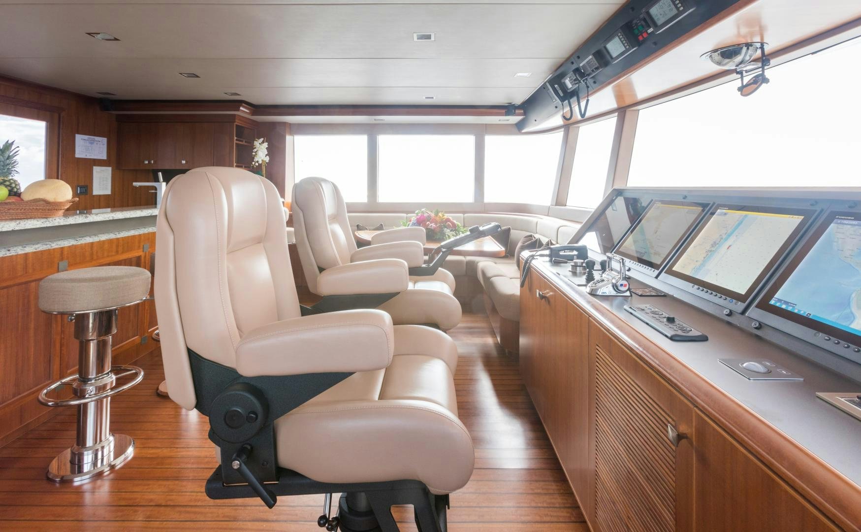a room with a desk and chairs aboard MY AURORA Yacht for Sale