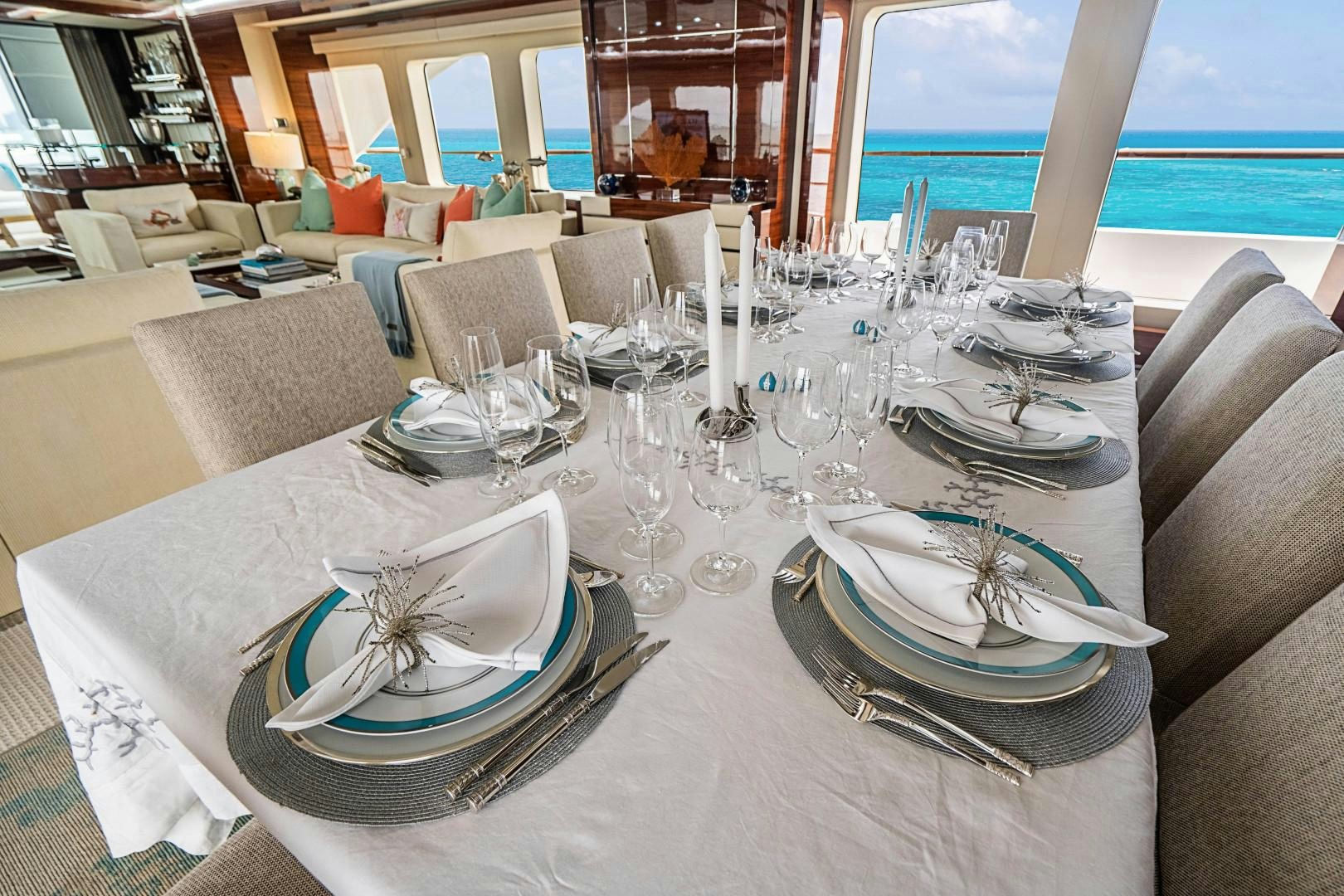 a table set for a dinner aboard No Name Yacht for Sale