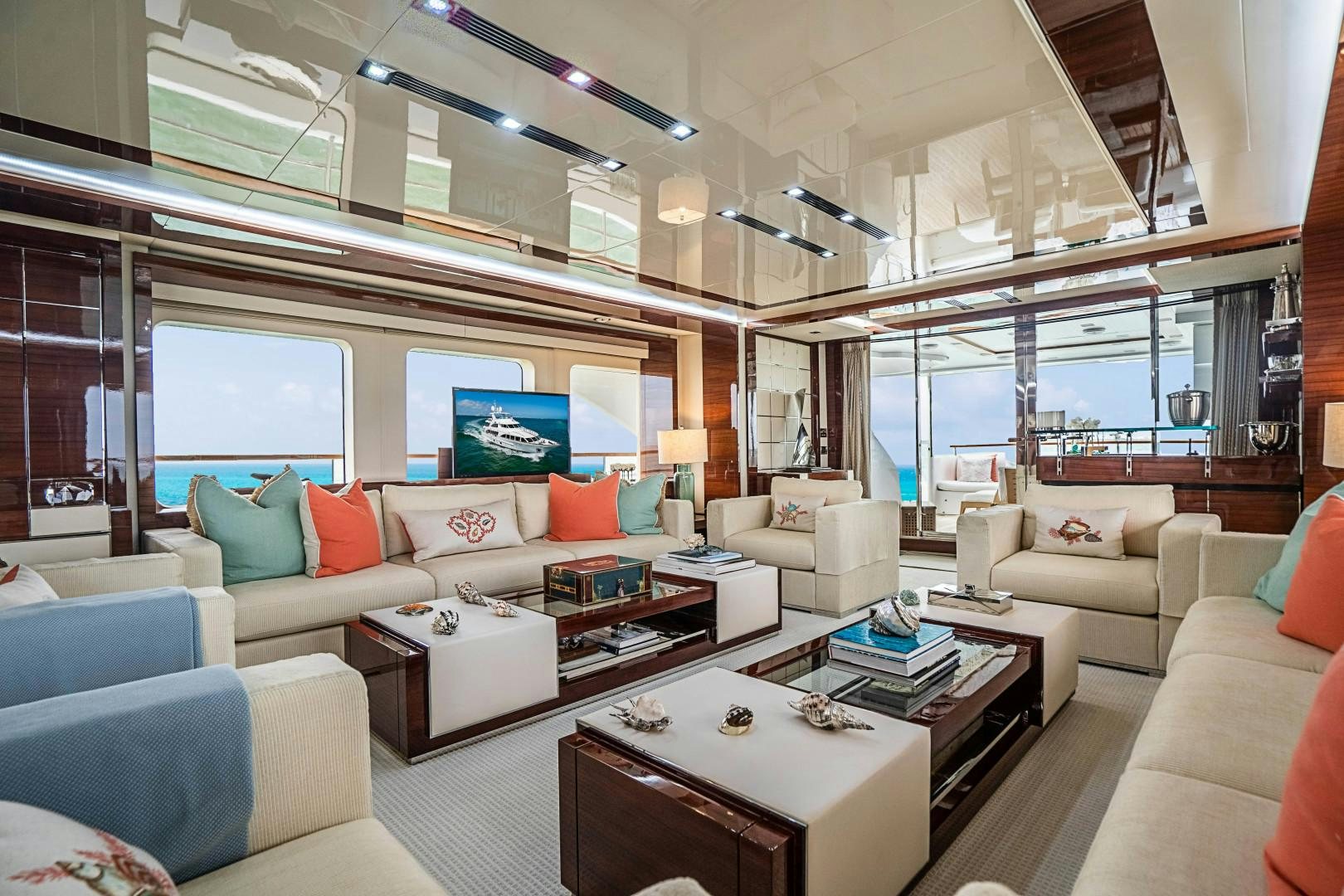 a living room with a large window aboard No Name Yacht for Sale