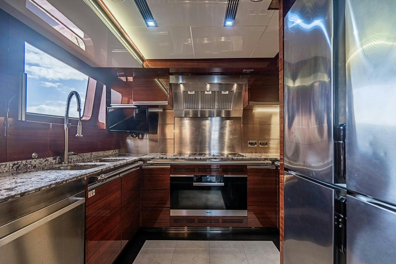 a kitchen with stainless steel appliances aboard No Name Yacht for Sale