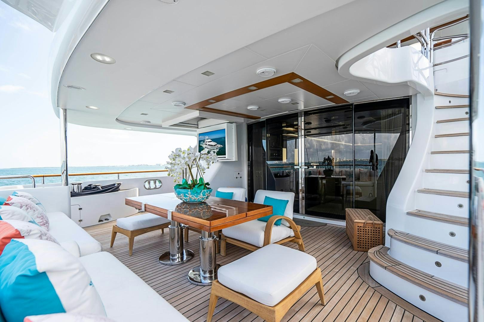 a room with a table and chairs aboard No Name Yacht for Sale