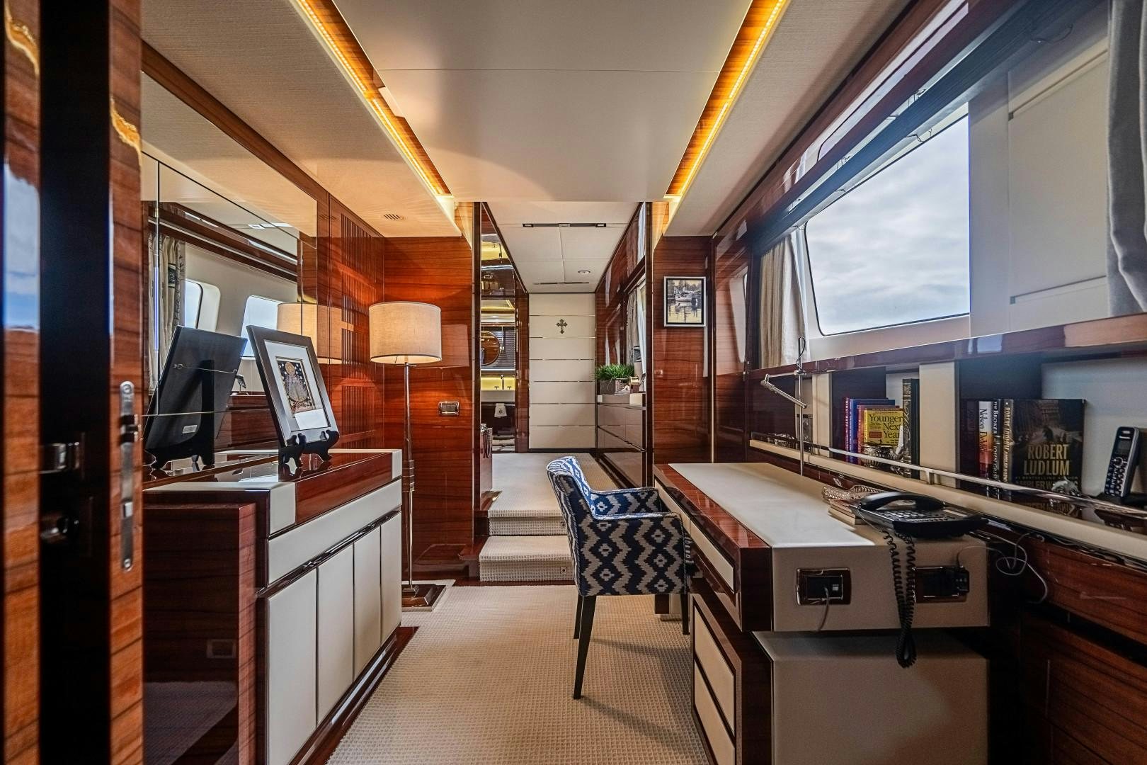 a room with a desk and computer aboard No Name Yacht for Sale