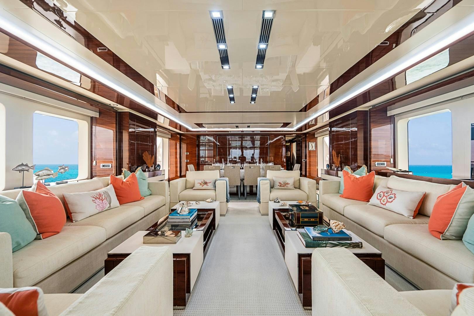 a room with a couch and a table aboard No Name Yacht for Sale