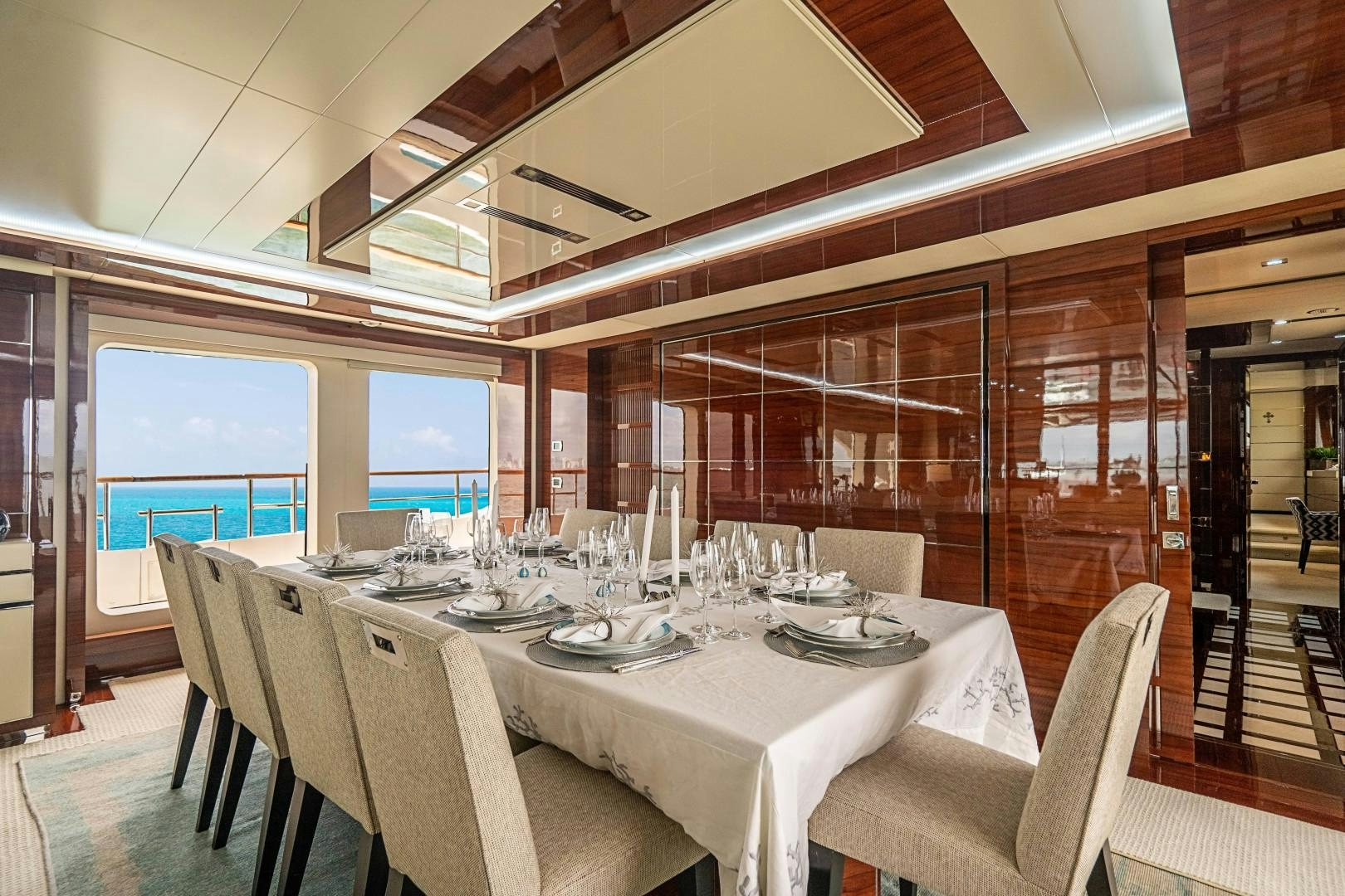 a table set for a dinner aboard No Name Yacht for Sale